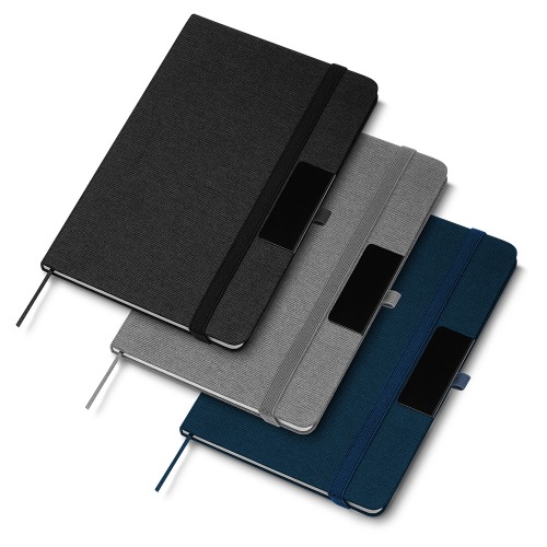 Caderno capa dura em material reciclável com placa de metal para personalização. 80 folhas. NÃO ACOMPANHA CANETA.21,3x14,5cm