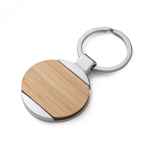 Chaveiro redondo de metal e bambu. 7,2x3,8cm