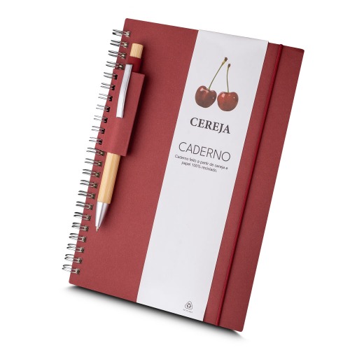 Caderno de anotações, com capa em papel 100% reciclado com elástico. Miolo de 70 folhas pautadas na cor bege; Com suporte para caneta em papel reciclável;  *Não acompanha caneta. 21 x 15 cm