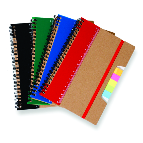 Caderno ecológico com autoadesivos e régua.
